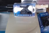 PS3 slim +20 jeux et 2 manettes